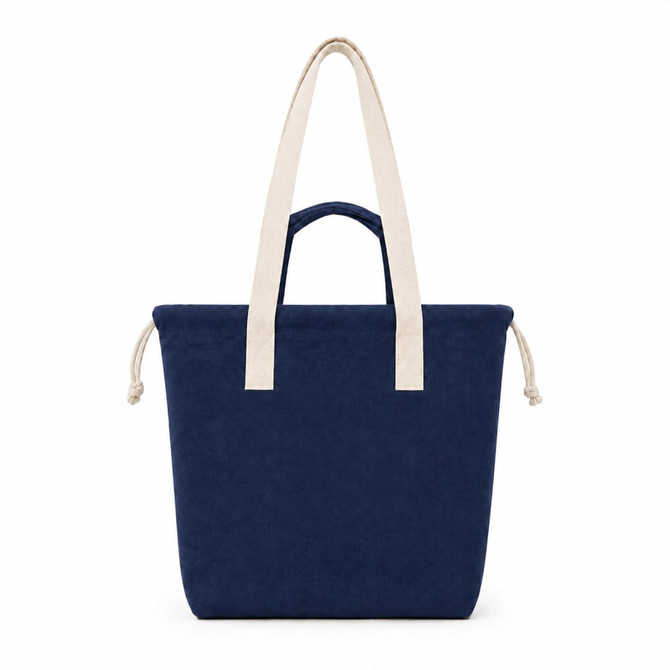 A navy blue tote bag with cream-coloured handles and a drawstring closure, featuring a logo.