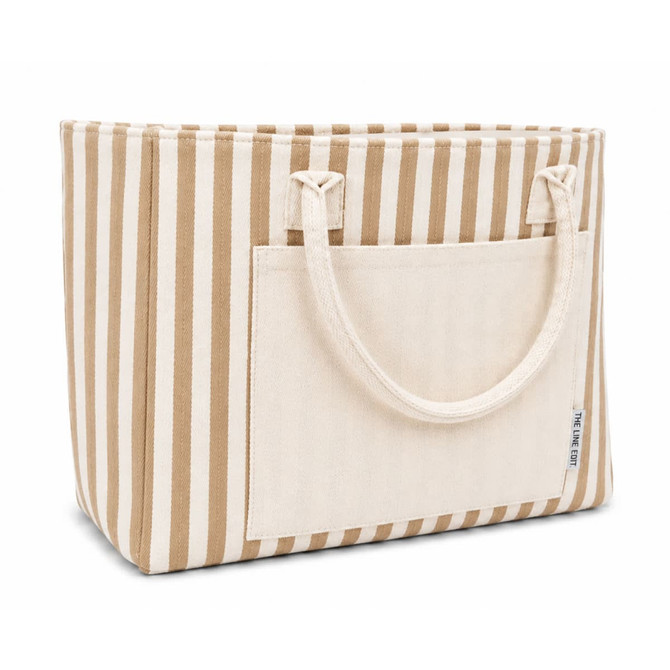 A tote bag with brown and cream stripes, featuring a front pocket and two sturdy handles. It has a logo on the side.