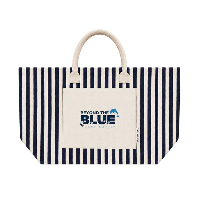 A striped tote bag in navy and cream with a front pocket and a branded logo.