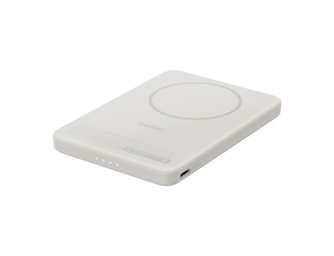 A slim, white magnetic power bank with a circular charging area and five indicator lights. It features a branding logo.