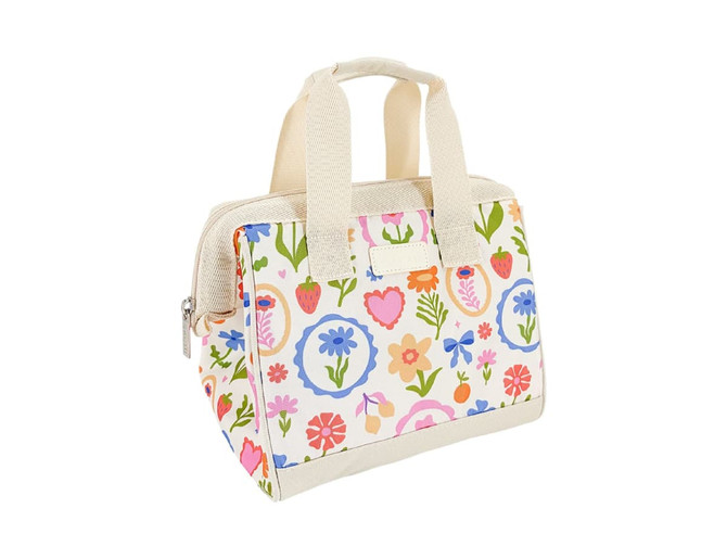 A floral insulated lunch bag in white, featuring colourful flowers and fruit patterns, with sturdy fabric handles.