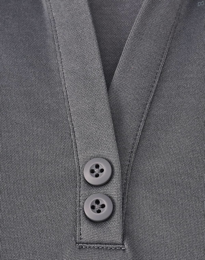 A grey sustainable poly/cotton polo shirt featuring a placket and two buttons. The shirt includes a logo.