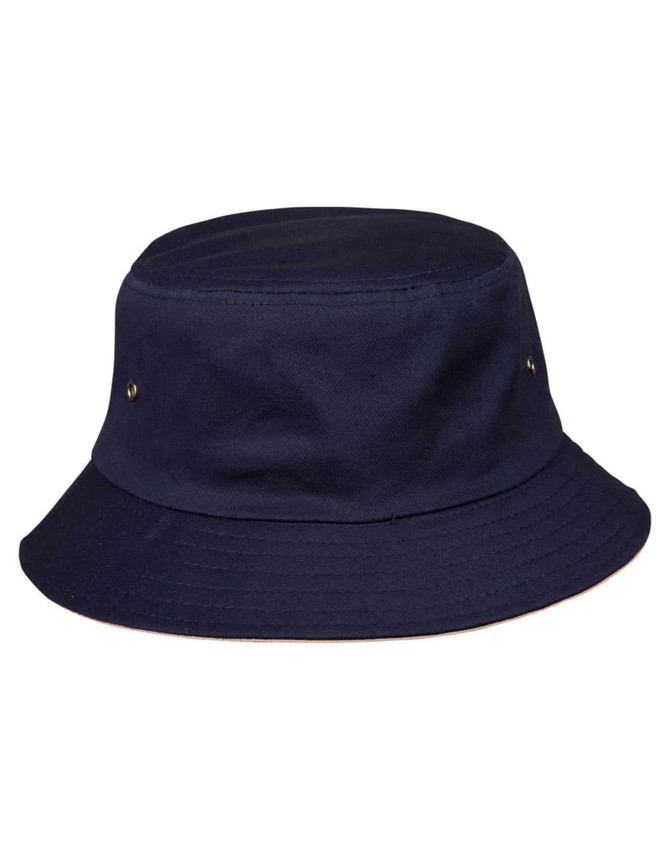 A navy bucket hat with a wide brim and two side ventilation holes. The hat features a simple design and no visible branding.