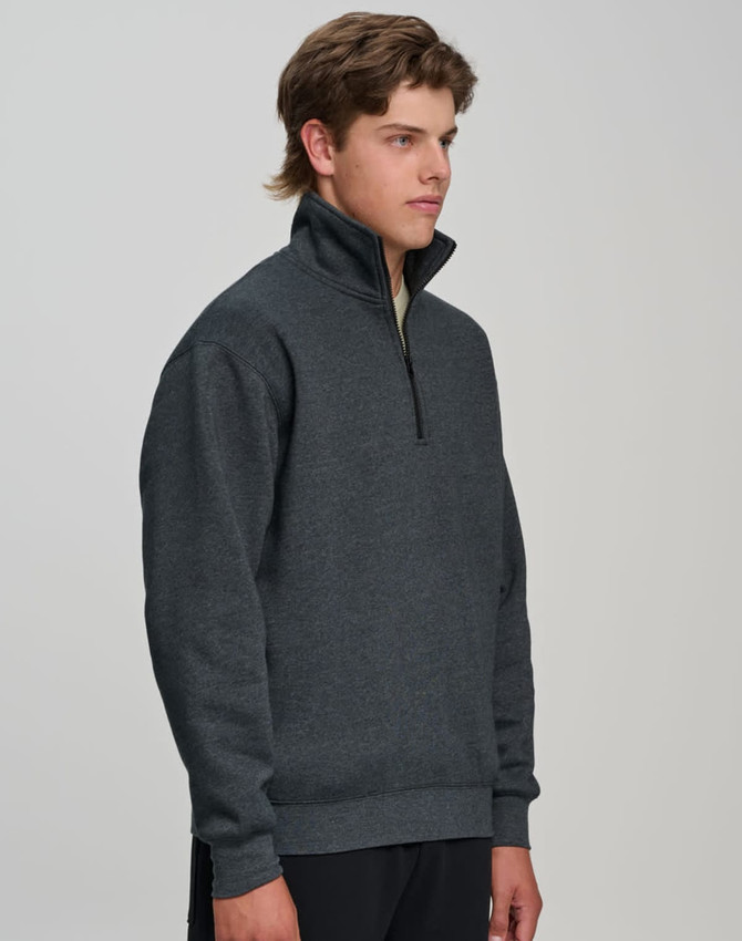 A casual 1/2 zip collar fleecy jumper in dark grey, featuring a branded logo. Suitable for cool weather.
