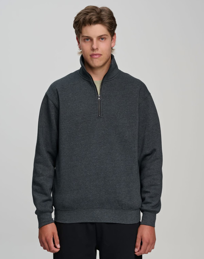 A grey 1/2 zip collar fleecy sweat jumper displayed on a model, featuring long sleeves and a relaxed fit.