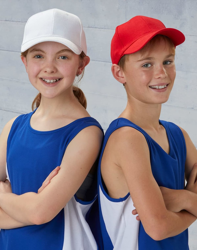 A red and a white brushed cotton cap, displayed on two smiling children wearing blue sports tops.