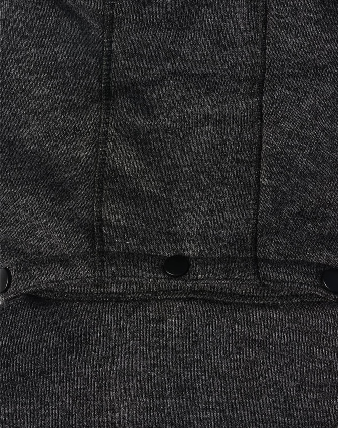 A dark grey fleece jacket featuring a textured fabric and black snap buttons. It has a logo on the garment.