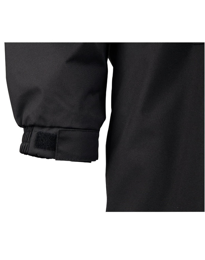 A close-up of the cuff of a black Long Line Stadium Jacket featuring adjustable fastenings.
