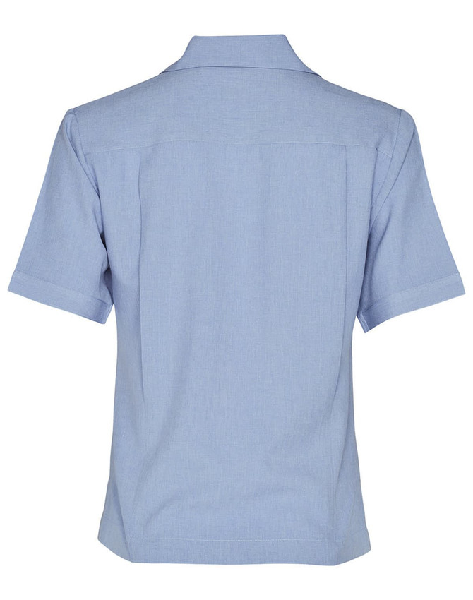 A light blue short sleeve overblouse featuring a collared neckline and a logo. Suitable for uniforms and tunics.
