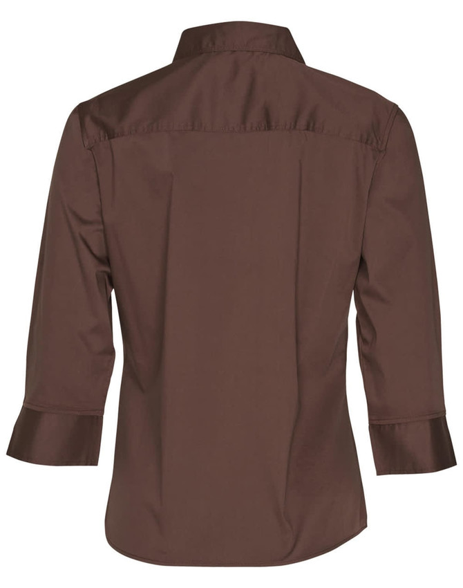 A brown women's 3/4 sleeve military shirt featuring a back yoke and cuffed sleeves. It has a logo.