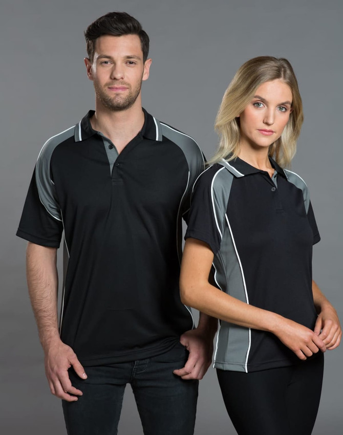 A black and grey men's polo shirt featuring a logo, modelled by a man and woman.
