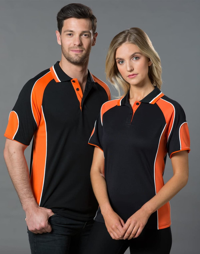 A black and orange polo shirt featuring a logo, displayed on a male and female model.