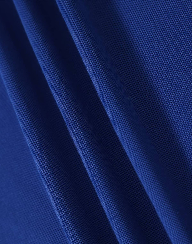 A close-up of textured fabric in a rich blue colour, featuring multiple folds for visual interest.