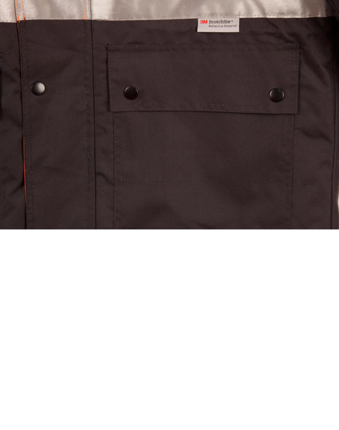 A black and grey safety jacket featuring 3M reflective tape and a front pocket with snap buttons. It has a branding label.