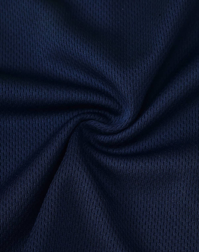 A close-up of navy fabric with a textured mesh pattern, suitable for polo shirts. The image features a logo.