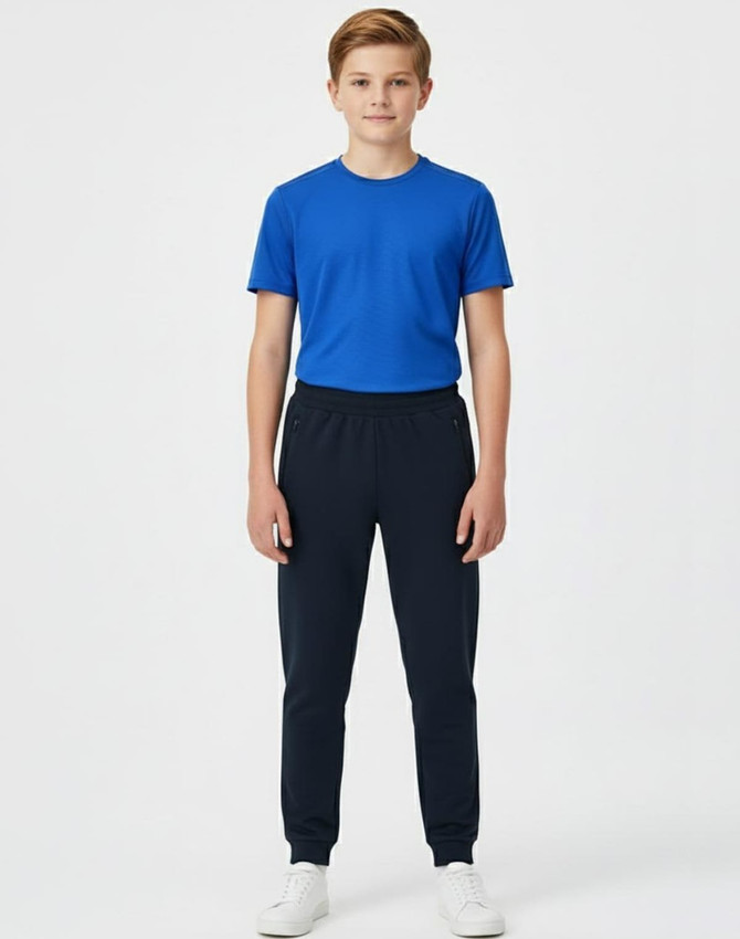 A boy wearing a red long-sleeve polo and black poly/cotton terry sweat pants, standing against a plain background.