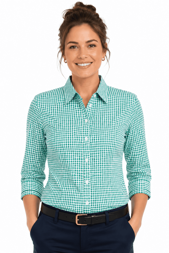 A long sleeve button-up shirt in a green and white check pattern, featuring a collar and a logo.