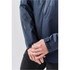A lightweight navy rain jacket with a zip closure and adjustable cuffs. Features branding on the sleeve.