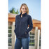 A navy polar fleece jacket with a zip front, standing pockets, and a high collar, modelled by a woman outdoors.