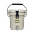 A beige ice bucket with a stainless steel faucet and a sturdy handle, featuring a logo on the front.