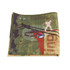 A folded green and patterned gym towel featuring an abstract design and a logo.