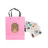 A pink knitted handle bag with lamination, accompanied by various decorative stickers. The bag features a bear design.