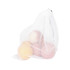 A white mesh produce bag containing several apples, showcasing its lightweight and breathable design.