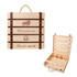 A wooden wine box with a natural finish, featuring a handle and four bottle holders inside. It has decorative engravings and leather straps.