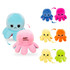 A large reversible plush octopus toy in blue and pink, with additional colours including yellow, orange, and green.