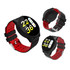 A round smart watch with a black and red strap, featuring a digital display with multiple readings.