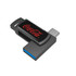 A black and silver USB flash drive with a logo, featuring a blue connector end.