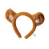 A fluffy orange headband with bear ears and white accents, featuring a small tag.