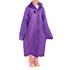 A purple reusable raincoat with a hood, featuring a logo, worn by a child in transparent rain boots.