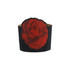 A black paper cup sleeve featuring a large red rose design, with a textured finish and a curved top.