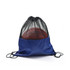 A blue drawstring mesh backpack containing a basketball, featuring a black mesh top and a branding logo.