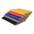 A stack of five A5 notebooks in yellow, pink, blue, grey, and black, featuring rainbow-striped edges and a logo. A stack of five A5 notebooks in yellow, pink, blue, grey, and black, featuring rainbow-striped edges and a logo.
