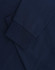 A navy blue long-sleeve T-shirt with folded sleeves and a subtle logo.