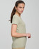 A light green premium cotton t-shirt for women, featuring short sleeves and a fitted design.