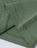 A green ladies' premium cotton short-sleeve tee shirt, featuring neat stitching at the sleeves. There is a logo present.