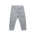 A pair of grey kids' track pants with an elastic waistband and a back pocket. Features a logo.