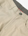 Men's flexi chino pants in a light beige colour, featuring a waistband with a button and pockets.