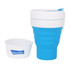 A drink bottle featuring a blue collapsible silicone coffee cup with a white lid and a small white container, branded.