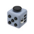 A fidget cube in light blue and black, featuring various tactile buttons and a shiny metal ball.