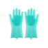 A pair of mint green silicone gloves feature textured surfaces for cleaning, with integrated brush-like nodules.
