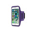A purple cell phone arm band holding a smartphone, featuring a logo and an adjustable strap.