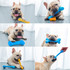 A blue and yellow PVC dog bone featured with a French Bulldog playing and chewing on it. The setting is bright and modern.