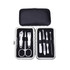 A stylish manicure set in a black case, featuring stainless steel tools including scissors, clippers, and tweezers. A stylish manicure set in a black case, featuring stainless steel tools including scissors, clippers, and tweezers.