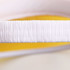 A close-up of a white PVC sunscreen hat featuring a textured band and a yellow interior.