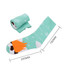 A pair of mint green socks with a playful pattern featuring a soccer ball and flame design, rolled up beside it.
