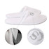 White hotel slippers with a soft texture and logo detailing, featuring a comfortable slip-on design.